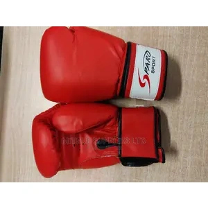 A Pair of Leather Boxing Glove 16oz Red.