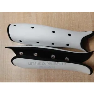 A Pair of Sparo Hockey Shin Guard White